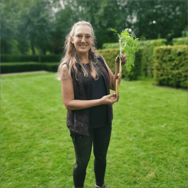 Lorna Chilmaid holding plant